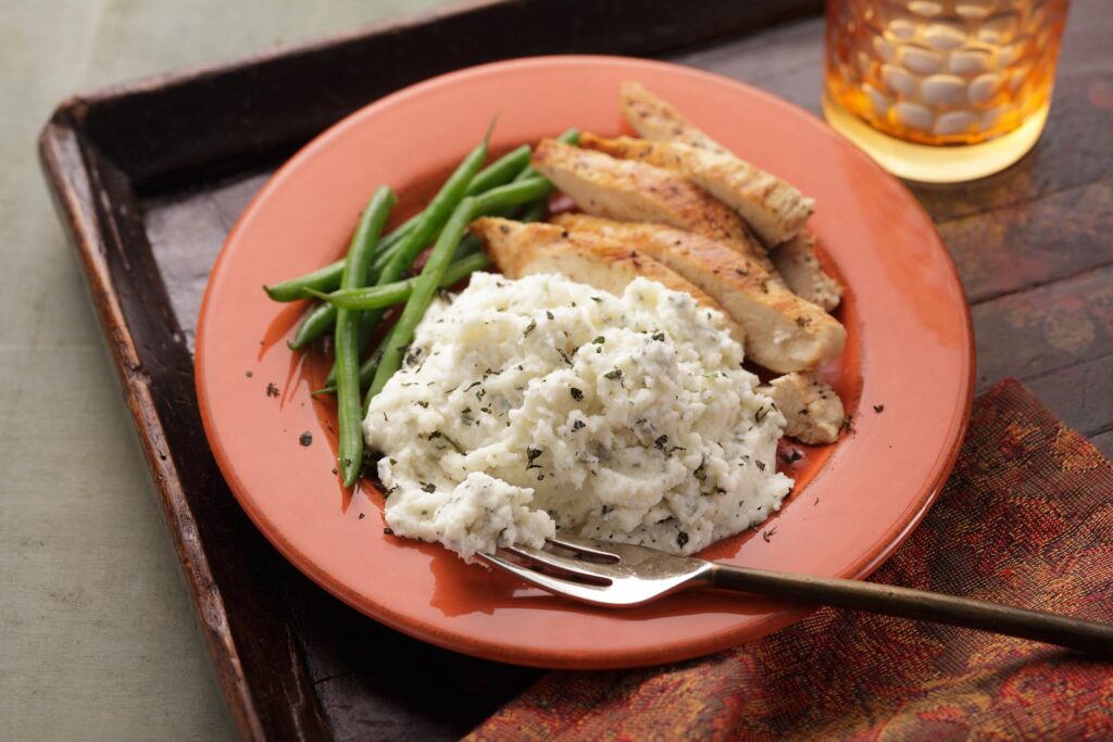 Add a little cheese and thyme to our Buttery Homestyle Mashed Potatoes