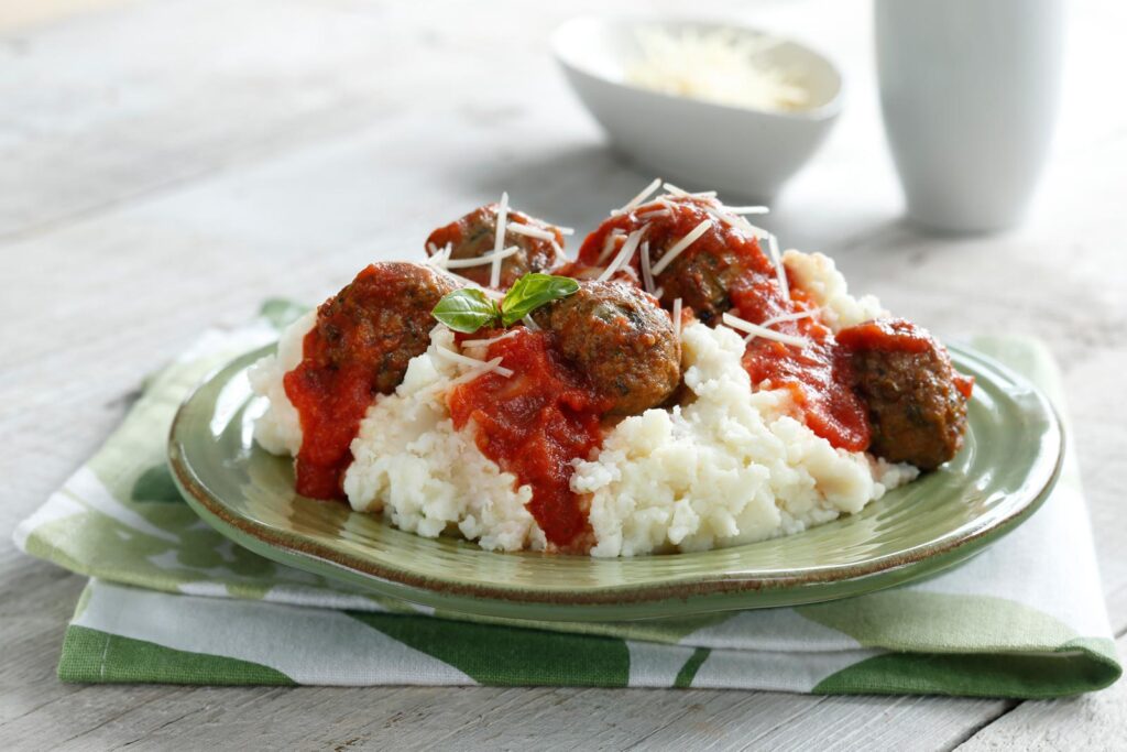 Roasted Garlic Mashed Potatoes with Meatballs and Marinara