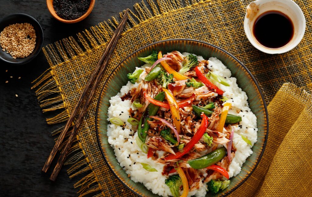 This Asian Mashed Potato Bowl recipe is full of colorful veggies and comes together in a snap with the use of prepared teriyaki sauce and Idahoan Mashed Potatoes.