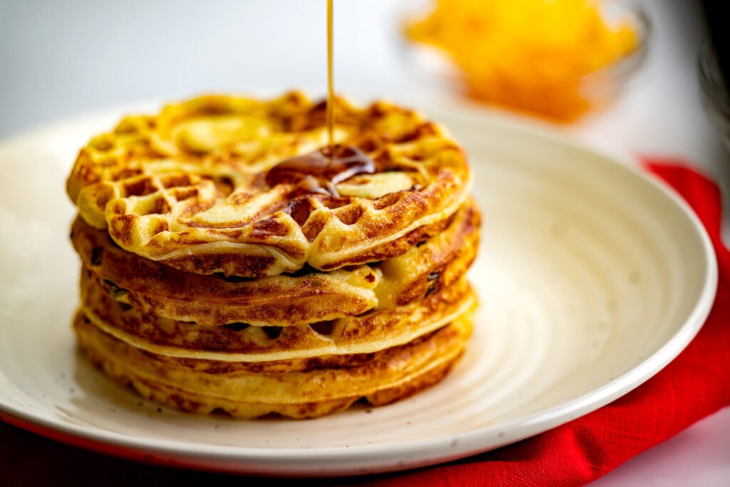 Waffles and maple syrup made with Idahoan Mashed Potatoes.